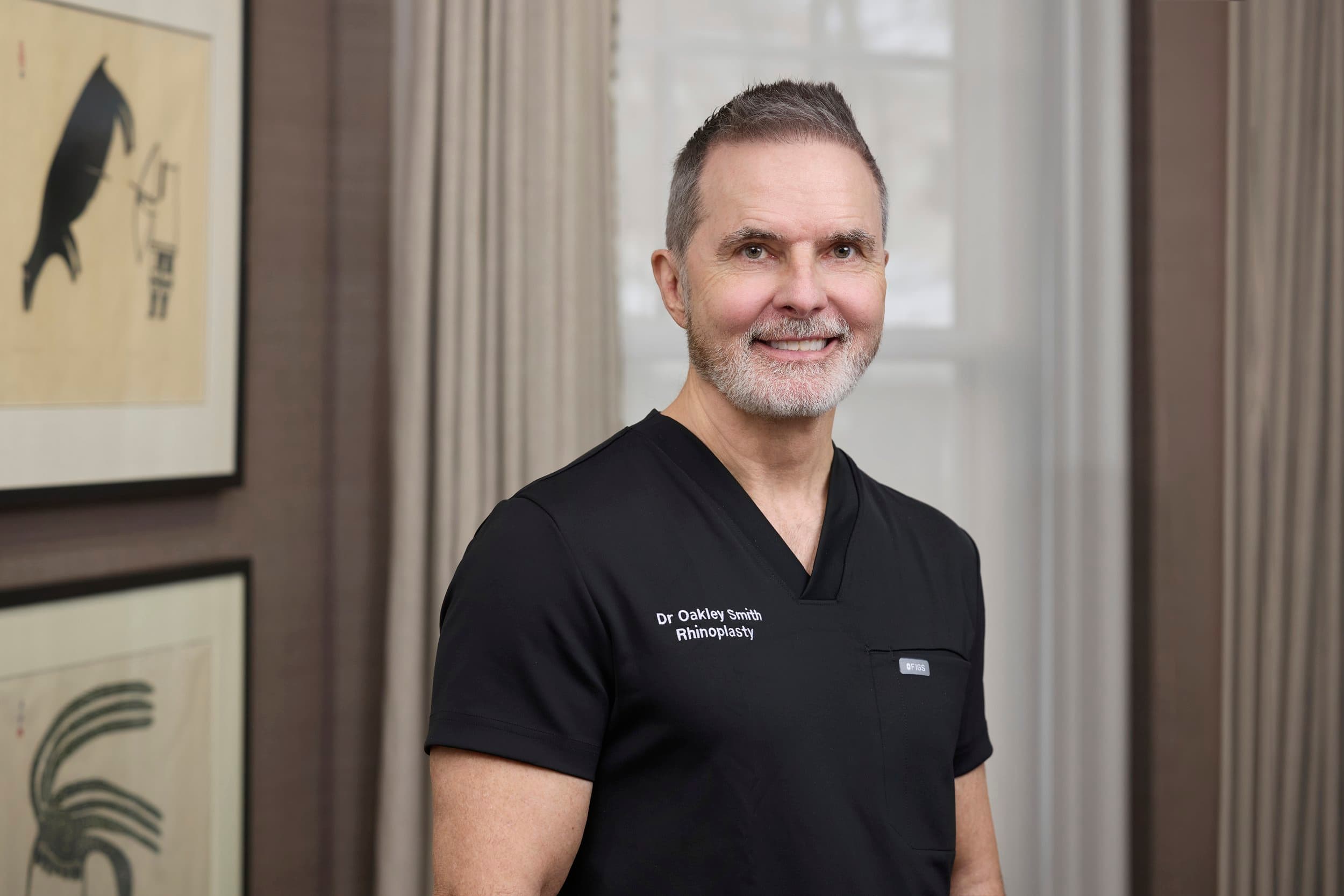 Dr. Oakley Smith standing in his clinic